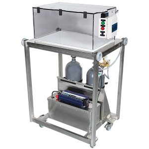  The image shows a Euthanex Smartbox Tabletop CO2 Euthanasia System. This is a veterinary device used for the humane and controlled administration of carbon dioxide for animal euthanasia. It features a clear acrylic chamber mounted on a stainless steel cart with shelves. The cart has wheels for easy mobility. There are two gas cylinders secured at the lower shelf, a digital control panel with indicator lights mounted on the chamber, and a blue battery backup unit on the bottom shelf. The system is designed for efficiency and minimal stress for small animals during euthanasia procedures in veterinary clinics or research facilities.